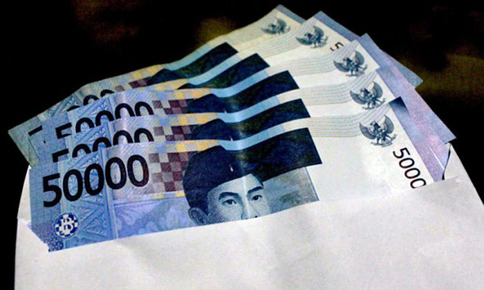 Amplop uang-ilustrasi (Sriwijaya Post)