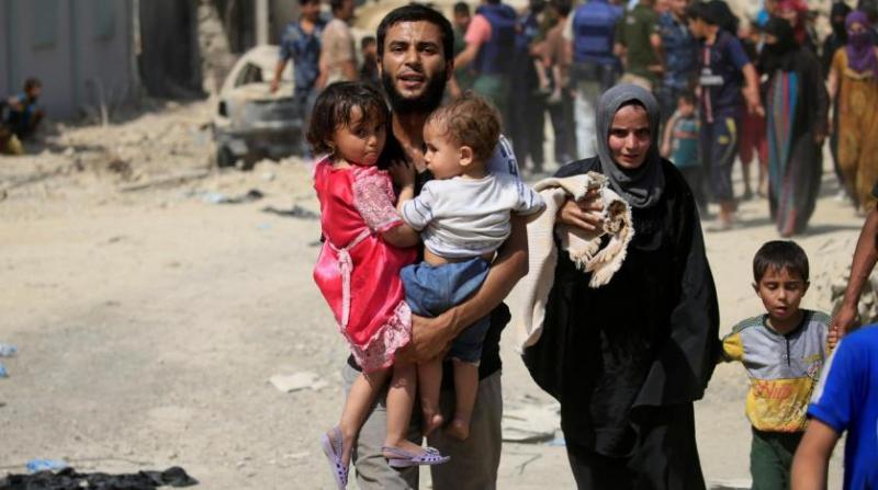 Rakyat Irak mengungsi karena perang (Foto: aawsat.com)