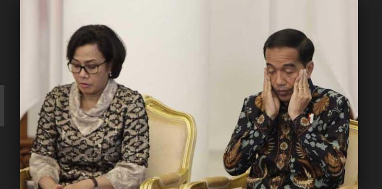 Menteri Keuangan Sri Mulyani Indrawati bersama dengan Presiden Joko Widodo (Jokowi) (Foto: Tempo)