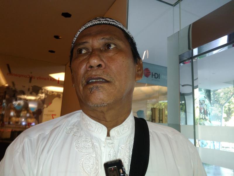 Syafri Alamsyah (58 tahun), ayah almarhum Farhan Syafero korban kerusuhan 21-22 Mei 2019, menuntut pengusutan pelaku penembak putranya. (Winna Wijaya/law-justice.co)