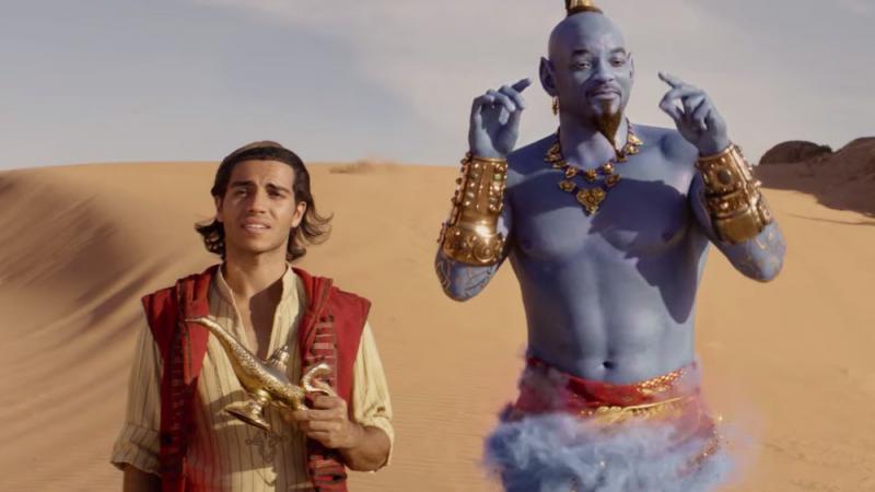 Will Smith (kanan), berperan sebagai jin bertubuh biru dalam versi baru film Aladdin (geektyrant)