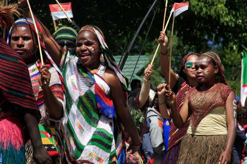 Warga Papua sedang melakukan pawai pada beberapa waktu lalu (Zonautara.com)