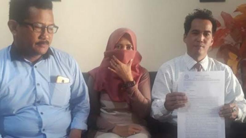 Pelaporan anggota DPRD Kabupaten Malang karena sebar foto tak senonoh dan zina (Nesiatimes.com)