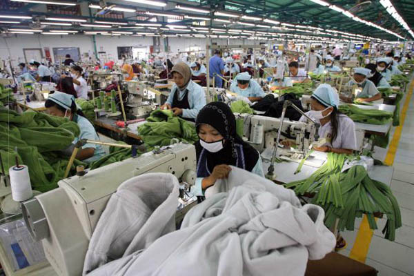 Ilustrasi pekerja pabrik tekstil (Foto:Bisnis Indonesia)