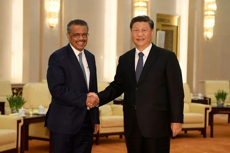 Presiden China Xi Jinping dengan Direktur Jenderal WHO Tedros Adhanom (kompas)