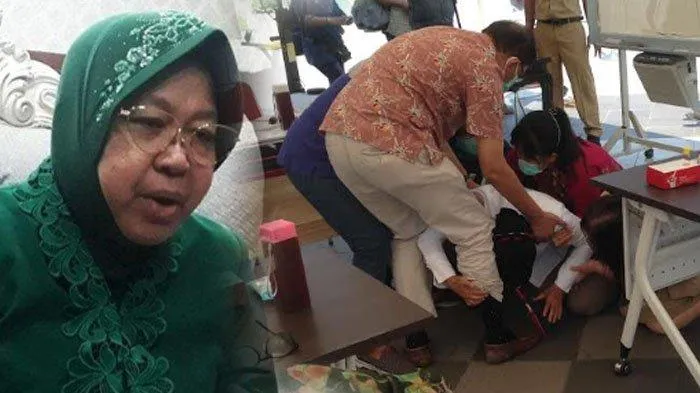 Wali Kota Surabaya Tri Rismaharini saat menangis dan sujud ke kaki dokter (tribunnews)