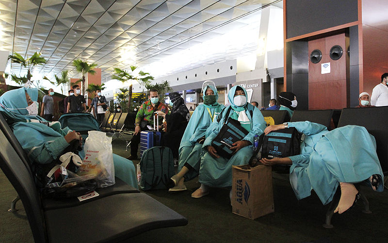 Bandara Soekarno-Hatta kembali melayani penerbangan jamaah umrah setelah ditutup sejak Februari 2020 lantaran pandemi Covid-19, Tangerang- Banten, Minggu (1/11). Robinsar Nainggolan