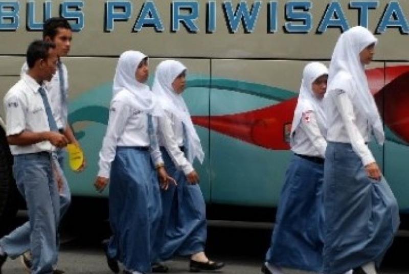 Ilustrasi Siswi Nonmuslim diwajibkan pakai jilbab (republika)