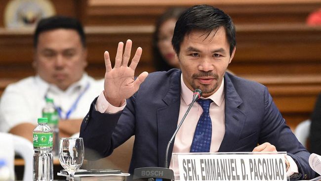 Mantan petinju Manny Pacquiao mengumumkan pencalonannya sebagai kandidat presiden Filipina. Ia menyatakan bahwa ini saatnya kaum tertindas menang. (AFP/Ted Aljibe)