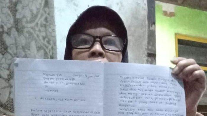  Ai Rukiah (59) ibu kandung Evi Noviyanti, Pekerja Migran Indonesia Asal Cianjur menyurati Presiden RI (tribun)