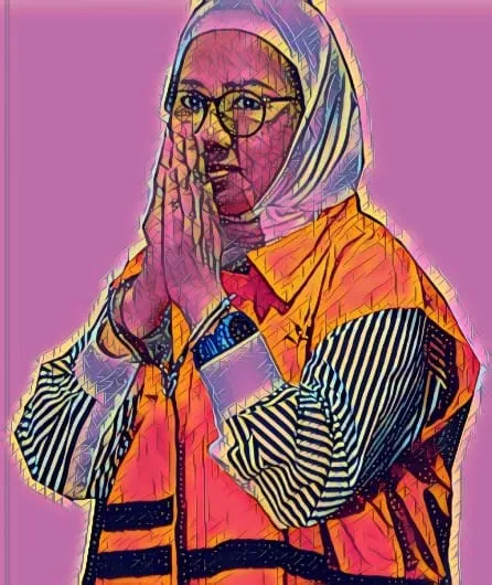 Mantan Direktur Utama Pertamina Karen Agustiawan mengenakan rompi oranye khas KPK.