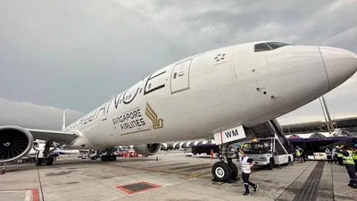 Singapore Airlines mengakui ada 1 penumpang SQ321 meninggal akibat turbulensi parah yang menimpa pesawat mereka rute London-Singapura, Selasa (21/5) sore. ( via REUTERS/Pongsak Suksi).