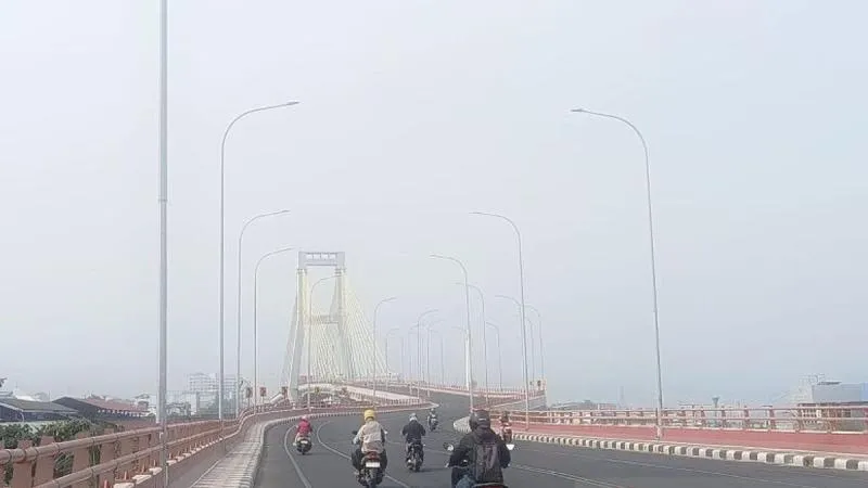 BMKG Sebut Seluruh Wilayah Sulawesi Utara Terdampak Kabut Asap. (voi).